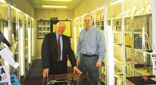 Anthony (right) welcoming Jim Lazarus, President of L&R Cleaning Fluids Manufacturer Company, circa 1992.